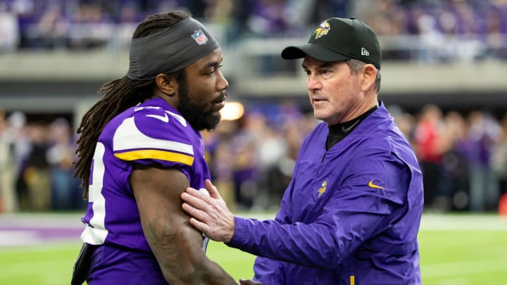 Dec 30, 2018; Minneapolis, MN, USA; Minnesota Vikings head coach Mike Zimmer and running back Dalvin Cook (33) meet before the game against Chicago Bears at U.S. Bank Stadium. 