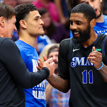 Feb 22, 2024; Dallas, Texas, USA;  Dallas Mavericks guard Kyrie Irving (11) celebrates with Mark Cuban during the second half against the Phoenix Suns at American Airlines Center. Mandatory Credit: Kevin Jairaj-Imagn Images