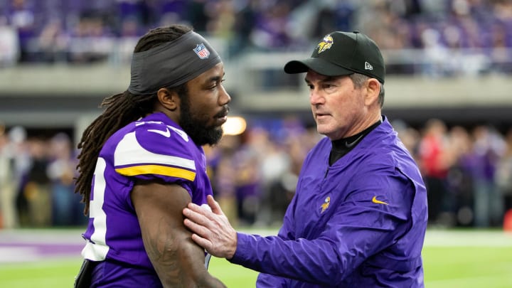 Dec 30, 2018; Minneapolis, MN, USA; Minnesota Vikings head coach Mike Zimmer and running back Dalvin Cook (33) meet before the game against Chicago Bears at U.S. Bank Stadium. Mandatory Credit: Brad Rempel-USA TODAY Sports