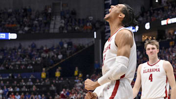 Mar 14, 2025; Nashville, TN, USA;  Alabama Crimson Tide forward Jarin Stevenson (15) celebrates the basket against the Kentucky Wildcats during the first half at Bridgestone Arena. Mandatory Credit: Steve Roberts-Imagn Images
