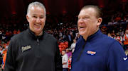 Mar 5, 2024; Champaign, Illinois, USA; Purdue Boilermakers head coach Matt Painter and Illinois Fighting Illini head coach Brad Underwood chat before the start of the game at State Farm Center. Mandatory Credit: Ron Johnson-Imagn Images