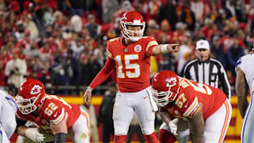 Nov 21, 2021; Kansas City, Missouri, USA; Kansas City Chiefs quarterback Patrick Mahomes (15) gestures on the line of scrimmage against the Dallas Cowboys during the second half at GEHA Field at Arrowhead Stadium. Mandatory Credit: Denny Medley-Imagn Images