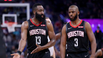 Apr 2, 2019; Sacramento, CA, USA; Houston Rockets guard James Harden (13) talks with guard Chris Paul (3) during a timeout in the third quarter against the Sacramento Kings at Golden 1 Center. Mandatory Credit: Cary Edmondson-USA TODAY Sports