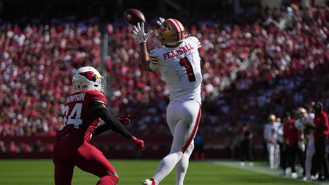 Sep 21, 2025; Santa Clara, California, USA; San Francisco 49ers wide receiver Ricky Pearsall (1) makes the catch inform of Arizona Cardinals safety Jalen Thompson (34) during the second half at Levi's Stadium. Mandatory Credit: Cary Edmondson-Imagn Images Sep 21, 2025; Santa Clara, California, USA; San Francisco 49ers wide receiver Ricky Pearsall (1) makes the catch inform of Arizona Cardinals safety Jalen Thompson (34) during the second half at Levi's Stadium. Mandatory Credit: Cary Edmondson-Imagn Images