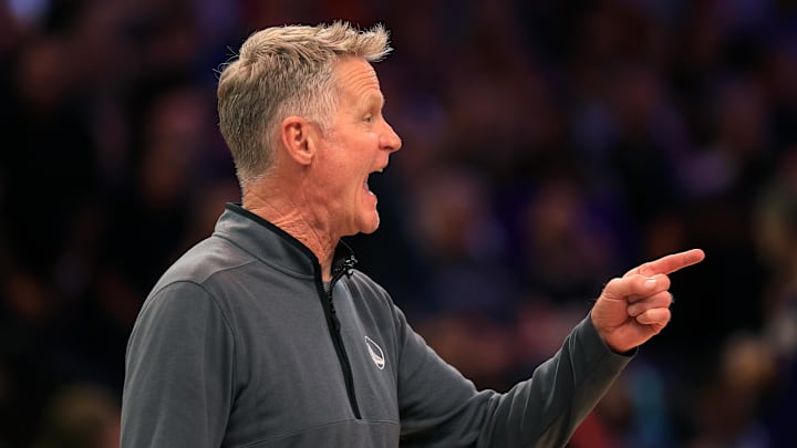 Apr 8, 2025; Phoenix, Arizona, USA; Golden State Warriors head coach Steve Kerr reacts against the Phoenix Suns during the first half at Footprint Center. Mandatory Credit: Mark J. Rebilas-Imagn Images