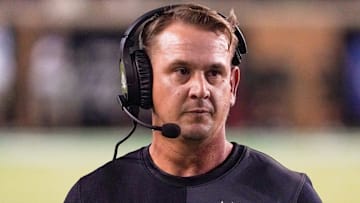 North Texas Mean Green coach Eric Morris stands on the sidelines against the South Florida Bulls during the second half of a game at DATCU Stadium.