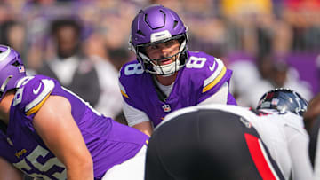 Aug 9, 2025; Minneapolis, Minnesota, USA; Minnesota Vikings quarterback Sam Howell (8) under center against the Houston Texans in the second quarter at U.S. Bank Stadium.