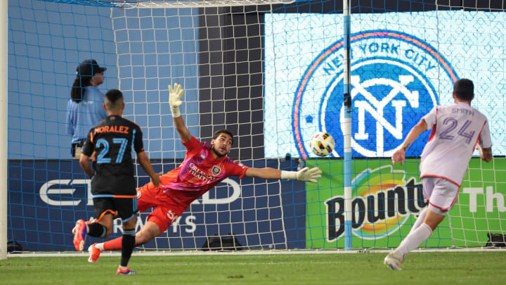 Jun 28, 2024; New York, New York, USA; Orlando City goalkeeper Javier Otero (50) tries to block a goal by New York City FC forward Monsef Bakrar (not pictured) in the second half at Yankee Stadium. Mandatory Credit: Vincent Carchietta-USA TODAY Sports