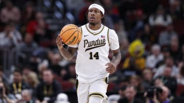 Purdue Boilermakers guard David Jenkins Jr. (14) brings the ball up court 