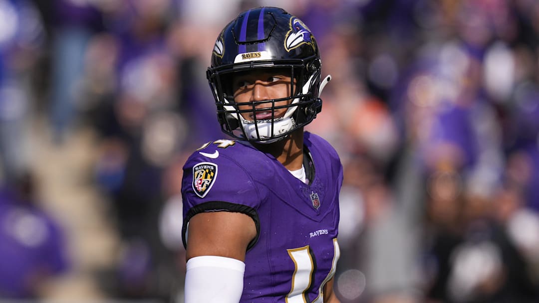 Nov 12, 2023; Baltimore, Maryland, USA;  Baltimore Ravens safety Kyle Hamilton (14) celebrates after scoring a touchdown against the Cleveland Browns during the first quarter at M&T Bank Stadium. Mandatory Credit: Jessica Rapfogel-Imagn Images