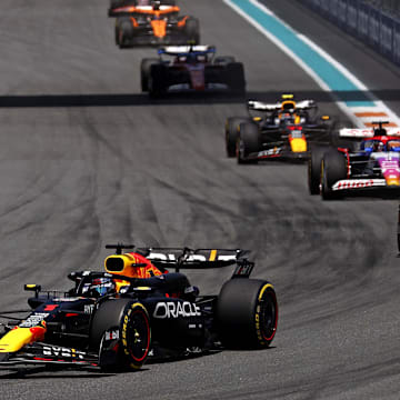 May 4, 2024; Miami Gardens, Florida, USA; Red Bull Racing driver Max Verstappen (1) lead the field into turn one during the F1 Sprint Race at Miami International Autodrome. Mandatory Credit: Peter Casey-Imagn Images