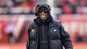Nov 25, 2023; Salt Lake City, Utah, USA; Colorado Buffaloes head coach Deion 'Coach Prime' Sanders on the field against the Utah Utes at Rice-Eccles Stadium. 