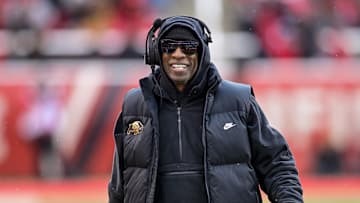Nov 25, 2023; Salt Lake City, Utah, USA; Colorado Buffaloes head coach Deion 'Coach Prime' Sanders on the field against the Utah Utes at Rice-Eccles Stadium. 