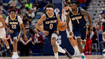 Nov 19, 2025; New Orleans, Louisiana, USA;  New Orleans Pelicans guard Jeremiah Fears (0) brings the ball up court against the Denver Nuggets during the second half  at Smoothie King Center. Mandatory Credit: Stephen Lew-Imagn Images