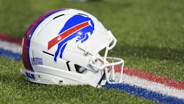 Sep 7, 2025; Orchard Park, New York, USA;  Detailed view of Buffalo Bills helmet on the field prior to the first quarter against the Baltimore Ravens at Highmark Stadium. Mandatory Credit: Gregory Fisher-Imagn Images