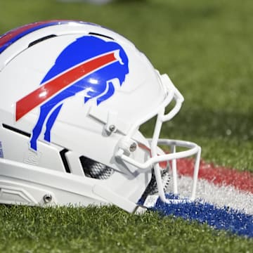 Sep 7, 2025; Orchard Park, New York, USA;  Detailed view of Buffalo Bills helmet on the field prior to the first quarter against the Baltimore Ravens at Highmark Stadium. Mandatory Credit: Gregory Fisher-Imagn Images