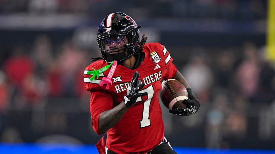 Texas Tech Red Raiders tight end Terrance Carter Jr. runs with the ball during the Big 12 championship.