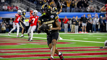 Dec 29, 2023; Arlington, TX, USA; Missouri Tigers wide receiver Luther Burden III (3) catches a pass for a touchdown against the Ohio State Buckeyes during the fourth quarter at AT&T Stadium. Mandatory Credit: Jerome Miron-USA TODAY Sports