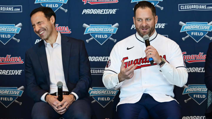 Nov 10, 2023; Cleveland, OH, USA;  Cleveland Guardians manager Stephen Vogt, right, talks to the media as president of baseball operations Chris Antonetti laughs during an introductory press conference at Progressive Field.