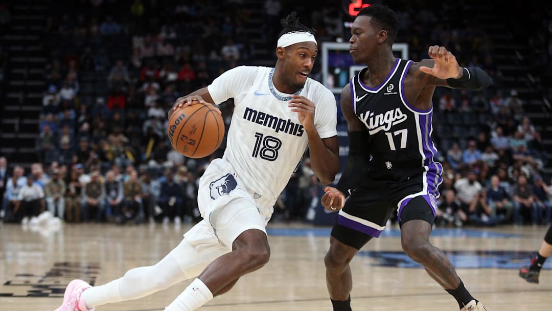 Nov 20, 2025; Memphis, Tennessee, USA; Memphis Grizzlies forward Olivier-Maxence Prosper (18) drives to the basket as Sacramento Kings guard Dennis Schroder (17) defends during the third quarter at FedExForum. Mandatory Credit: Petre Thomas-Imagn Images