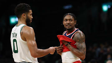 Oct 27, 2021; Boston, Massachusetts, USA; Boston Celtics forward Jayson Tatum (0) points at Washington Wizards guard Bradley Beal (3) after their game at TD Garden. Mandatory Credit: Winslow Townson-Imagn Images