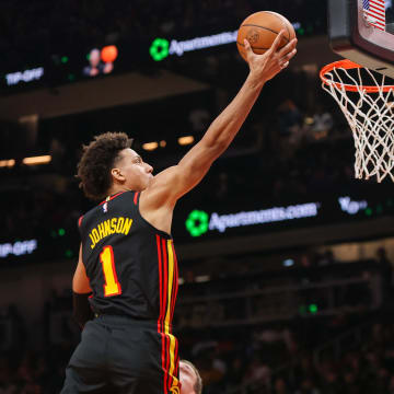 Apr 9, 2024; Atlanta, Georgia, USA; Atlanta Hawks forward Jalen Johnson (1) shoots against the Miami Heat in the second half at State Farm Arena. Mandatory Credit: Brett Davis-USA TODAY Sports
