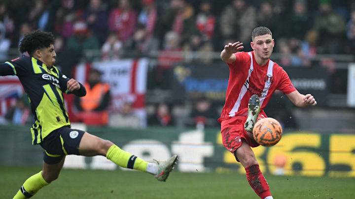 Jamie Donley in action against Manchester City