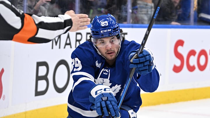 Apr 1, 2024; Toronto, Ontario, CAN; Toronto Maple Leafs forward Nick Robertson (89) celebrates after scoring a goal against the Florida Panthers in the first period at Scotiabank Arena. Mandatory Credit: Dan Hamilton-Imagn Images