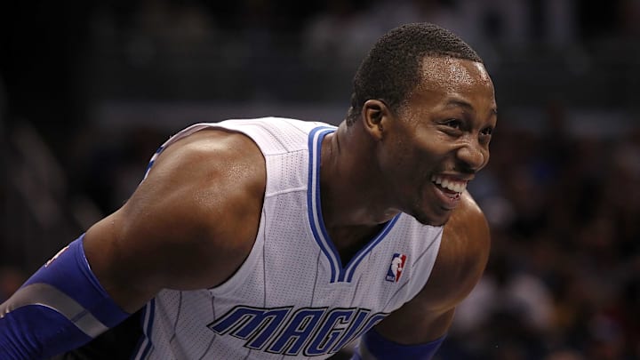 March 16, 2012; Orlando FL, USA; Orlando Magic center Dwight Howard (12) smiles during the second half against the New Jersey Nets at Amway Center. Orlando Magic defeated the New Jersey Nets 86-70. Mandatory Credit: Kim Klement-Imagn Images