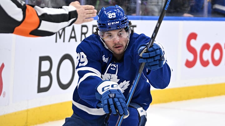 Apr 1, 2024; Toronto, Ontario, CAN; Toronto Maple Leafs forward Nick Robertson (89) celebrates after scoring a goal against the Florida Panthers in the first period at Scotiabank Arena. Mandatory Credit: Dan Hamilton-Imagn Images