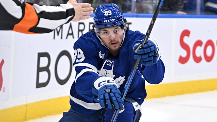 Apr 1, 2024; Toronto, Ontario, CAN; Toronto Maple Leafs forward Nick Robertson (89) celebrates after scoring a goal against the Florida Panthers in the first period at Scotiabank Arena. Mandatory Credit: Dan Hamilton-Imagn Images