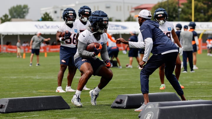 Jul 26, 2024; Englewood, CO, USA; Denver Broncos running back Samaje Perine (25) during training camp at Broncos Park Powered by CommonSpirit. Mandatory Credit: Isaiah J. Downing-USA TODAY Sports