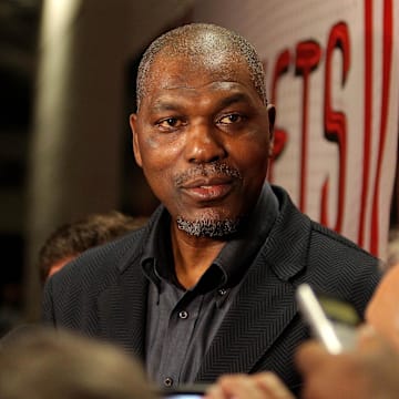 Feb 7, 2017; Houston, TX, USA; Former Houston Rocket center Hakeem Olajuwon speaks to reporters prior to the game between the Houston Rockets and the Orlando Magic at Toyota Center. Mandatory Credit: Erik Williams-Imagn Images