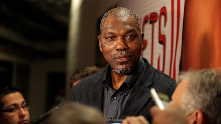 Feb 7, 2017; Houston, TX, USA; Former Houston Rocket center Hakeem Olajuwon speaks to reporters prior to the game between the Houston Rockets and the Orlando Magic at Toyota Center. Mandatory Credit: Erik Williams-Imagn Images