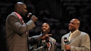 TNT anchor Kenny Smith introduces Shaquille O'Neal and Charles Barkley before the BBVA rising stars challenge