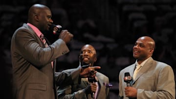 TNT anchor Kenny Smith introduces Shaquille O'Neal and Charles Barkley before the BBVA rising stars challenge