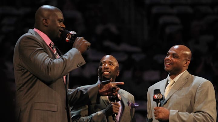 TNT anchor Kenny Smith introduces Shaquille O'Neal and Charles Barkley before the BBVA rising stars challenge
