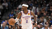 Oct 27, 2025; Dallas, Texas, USA; Oklahoma City Thunder guard Shai Gilgeous-Alexander (2) brings the ball up court against the Dallas Mavericks during the second quarter at the American Airlines Center. Mandatory Credit: Jerome Miron-Imagn Images