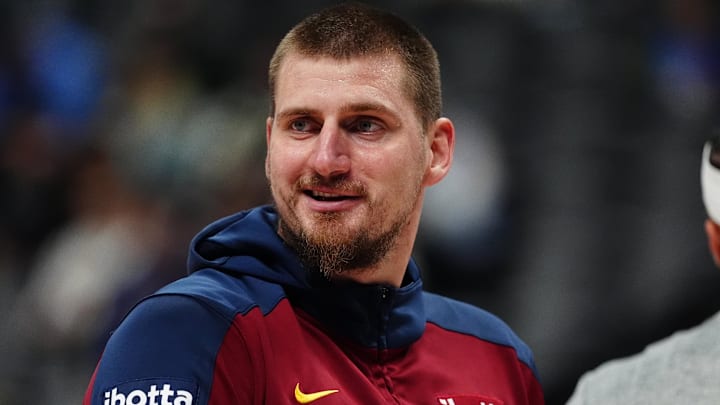 Nov 8, 2024; Denver, Colorado, USA; Denver Nuggets center Nikola Jokic (15) reacts before a game against the Miami Heat at Ball Arena. Mandatory Credit: Ron Chenoy-Imagn Images