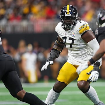 Sep 8, 2024; Atlanta, Georgia, USA; Pittsburgh Steelers offensive tackle Broderick Jones (77) blocks against the Atlanta Falcons in the fourth quarter at Mercedes-Benz Stadium. Mandatory Credit: Brett Davis-Imagn Images