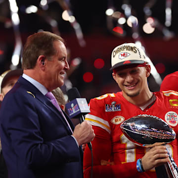 Feb 11, 2024; Paradise, Nevada, USA; Kansas City Chiefs quarterback Patrick Mahomes (15) celebrates with the Vince Lombardi Trophy after defeating the San Francisco 49ers in Super Bowl LVIII at Allegiant Stadium. Mandatory Credit: Mark J. Rebilas-Imagn Images