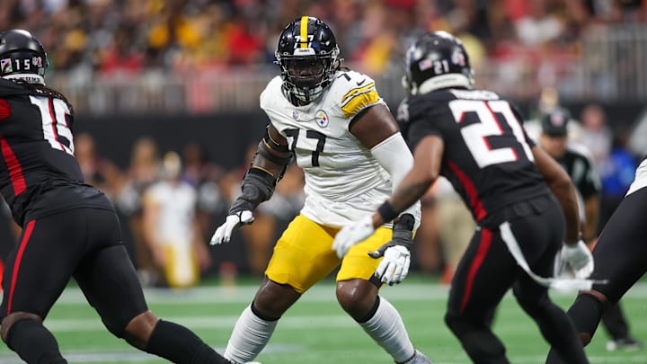 Sep 8, 2024; Atlanta, Georgia, USA; Pittsburgh Steelers offensive tackle Broderick Jones (77) blocks against the Atlanta Falcons in the fourth quarter at Mercedes-Benz Stadium. Mandatory Credit: Brett Davis-Imagn Images