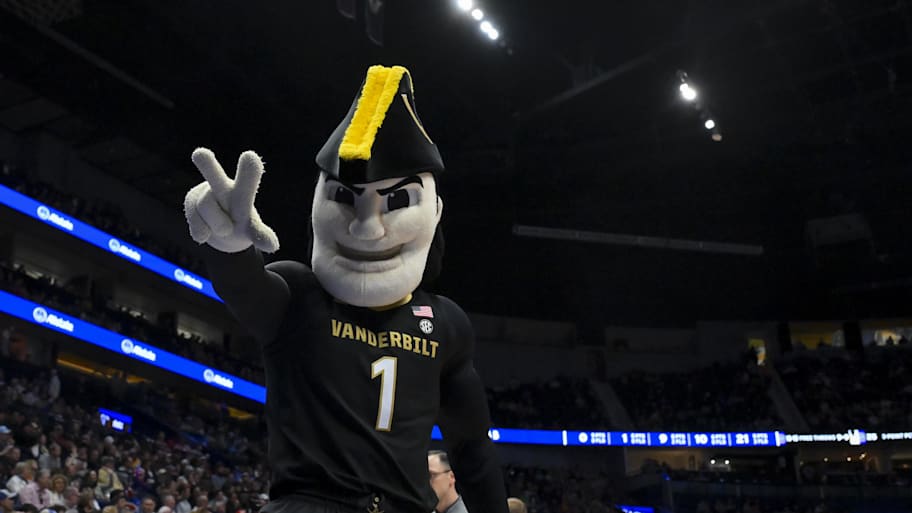 Mr. Commodore flashes an apparent peace sign against Florida.