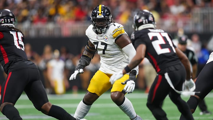 Sep 8, 2024; Atlanta, Georgia, USA; Pittsburgh Steelers offensive tackle Broderick Jones (77) blocks against the Atlanta Falcons in the fourth quarter at Mercedes-Benz Stadium. Mandatory Credit: Brett Davis-Imagn Images Sep 8, 2024; Atlanta, Georgia, USA; Pittsburgh Steelers offensive tackle Broderick Jones (77) blocks against the Atlanta Falcons in the fourth quarter at Mercedes-Benz Stadium. Mandatory Credit: Brett Davis-Imagn Images