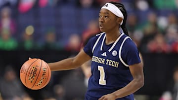Mar 7, 2025; Greensboro, NC, USA;  Georgia Tech Yellow Jackets guard Chazadi Wright (1) dribbles the ball during the first quarter against NC State Wolfpack at First Horizon Coliseum. Mandatory Credit: Cory Knowlton-Imagn Images