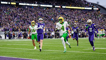 Oregon wide receiver Malik Benson breaks away for a touchdown as the Oregon Ducks take on the Washington Huskies on Nov. 29, 2025, at Husky Stadium in Seattle, Washington.