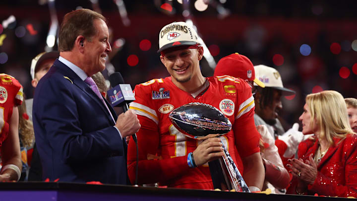 Feb 11, 2024; Paradise, Nevada, USA; Kansas City Chiefs quarterback Patrick Mahomes (15) celebrates with the Vince Lombardi Trophy after defeating the San Francisco 49ers in Super Bowl LVIII at Allegiant Stadium. Mandatory Credit: Mark J. Rebilas-Imagn Images