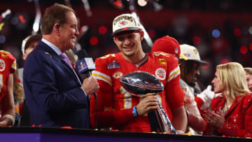 Feb 11, 2024; Paradise, Nevada, USA; Kansas City Chiefs quarterback Patrick Mahomes (15) celebrates with the Vince Lombardi Trophy after defeating the San Francisco 49ers in Super Bowl LVIII at Allegiant Stadium. Mandatory Credit: Mark J. Rebilas-USA TODAY Sports