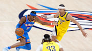 Jun 22, 2025; Oklahoma City, Oklahoma, USA; Oklahoma City Thunder guard Shai Gilgeous-Alexander (2) dribbles the ball against Indiana Pacers guard Andrew Nembhard (2) during the first half of game seven of the 2025 NBA Finals at Paycom Center. Mandatory Credit: Alonzo Adams-Imagn Images