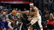 Mar 11, 2023; Los Angeles, California, USA; Los Angeles Clippers forward Paul George (13) dribbles the ball against New York Knicks guard Josh Hart (3) during the second half at Crypto.com Arena. Mandatory Credit: Kiyoshi Mio-USA TODAY Sports